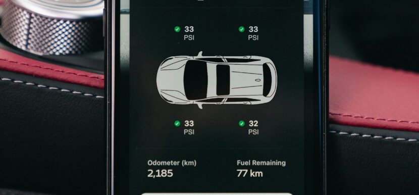 Car dashboard display showing tire pressure monitoring information