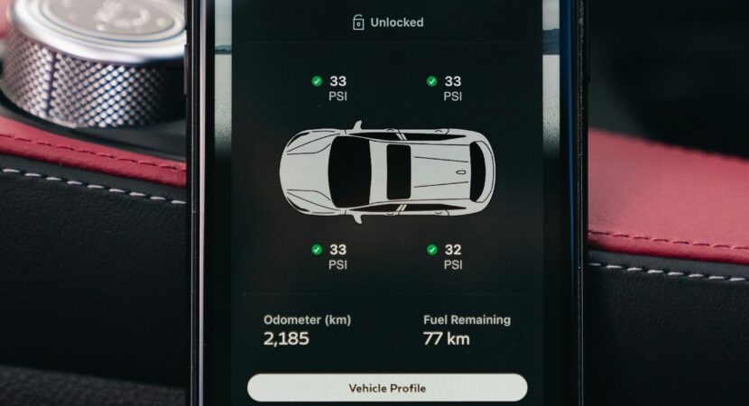 Car dashboard display showing tire pressure monitoring information